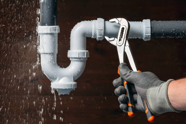 Professional Emergency Plumber technician working in Larrabee, IA